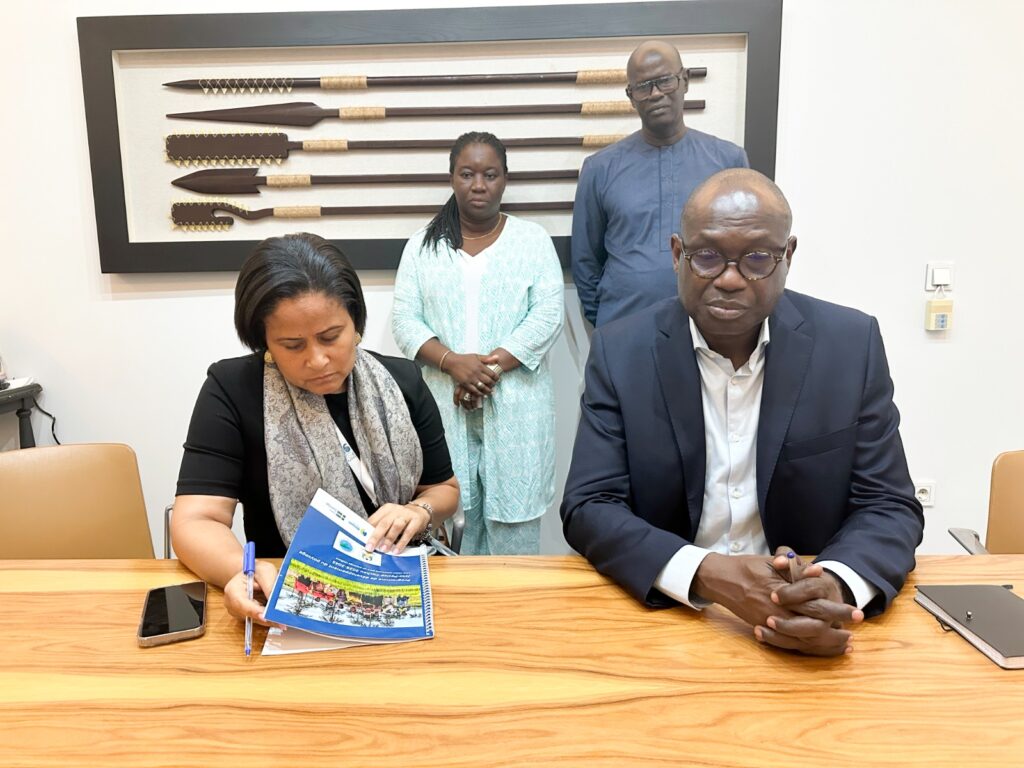 Ms Aïssa Régala de Barros, Director-General of IBAP and Mr Ibrahima Thiam, Wetlands International Africa at the signing ceremony of the JPC Landscape Development Programme 2026–2045